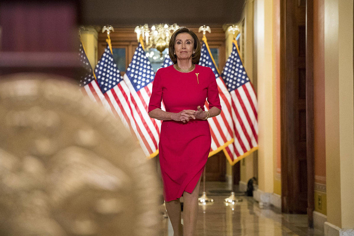 House Speaker Nancy Pelosi of Calif. arrives to read a statement outside her office on Capitol ...
