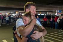 In this Sunday, March 22, 2020 photo, Hope Preston welcomes home her brother Elder Kaleb Presto ...