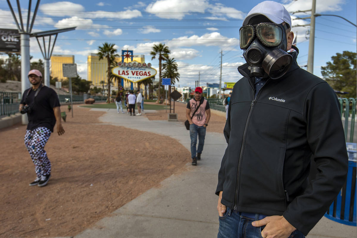 Gerard Moreno makes a stop at the "Welcome to Fabulous Las Vegas Nevada" sign amid a ...