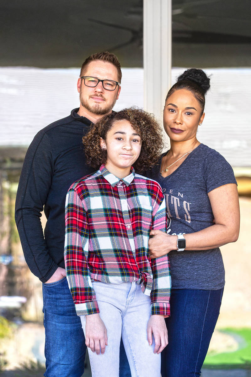 Jason and Erika Reed, with daughter Madison at their home in North Las Vegas on Tuesday, March ...
