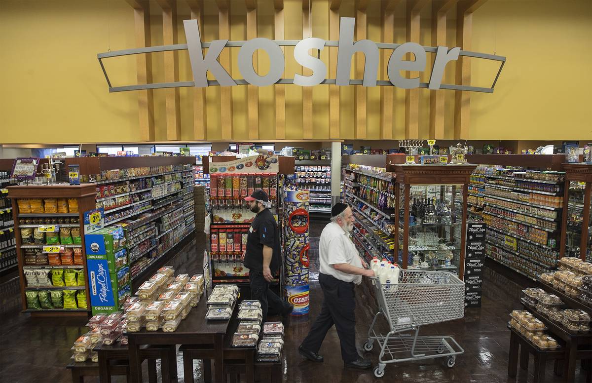 Customers shop in the Kosher Experience section at Smith's at 2211 N. Rampart Blvd. (Benjamin H ...