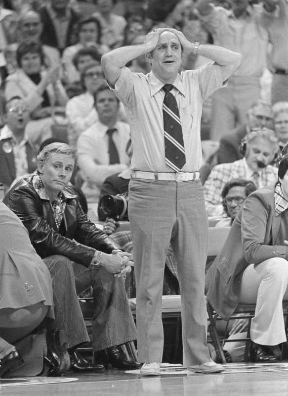 FILE - In this March 26, 1977, file photo, UNLV coach Jerry Tarkanian holds his head in final m ...
