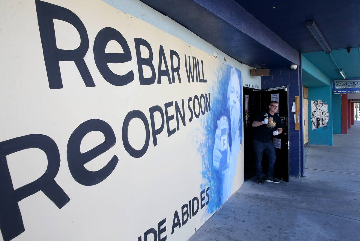 Derek Stonebarger, owner of Rebar in the Arts District in talks to one of his Main Street neigh ...