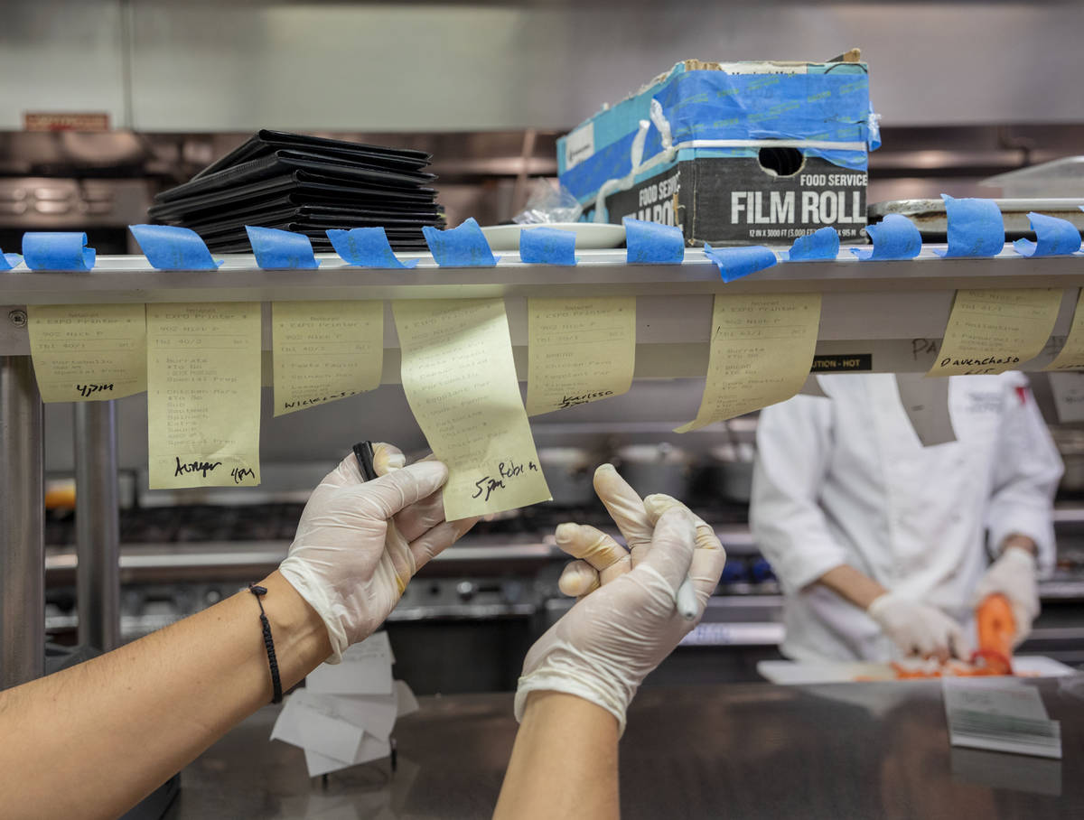 To-go orders are prepared at Gaetano's Ristorante for curbside pickup at the restaurant in Hend ...