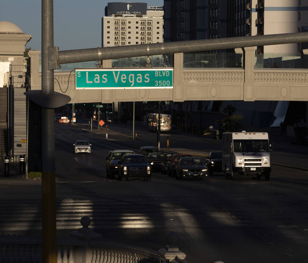 The sun sets Las Vegas Boulevard on the Strip on Tuesday, March 24, 2020, in Las Vegas. (Ellen ...