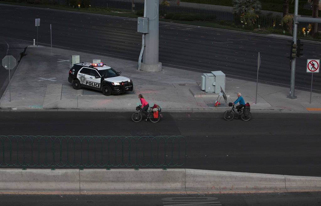 Bikers travel through the vacant Strip on Tuesday, March 24, 2020, in Las Vegas. (Ellen Schmidt ...