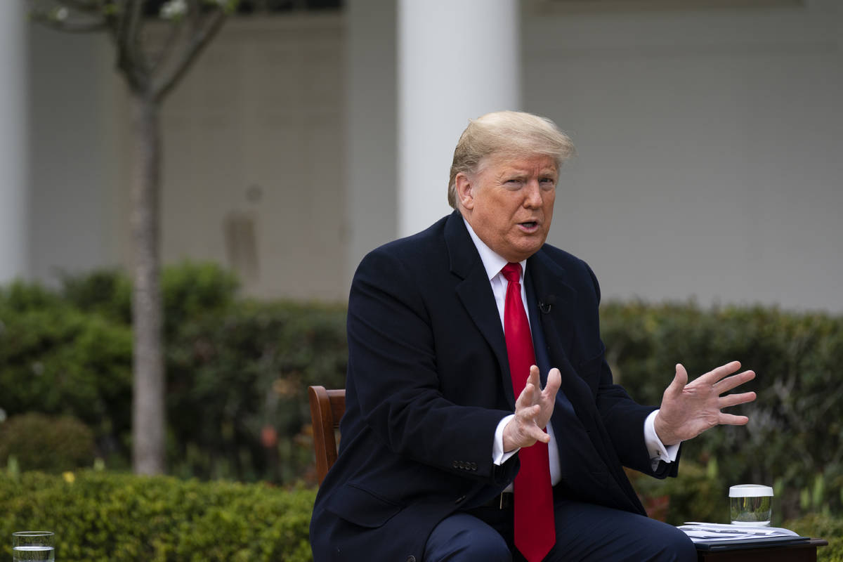 President Donald Trump speaks during a FOX News Channel virtual town hall with members of the c ...