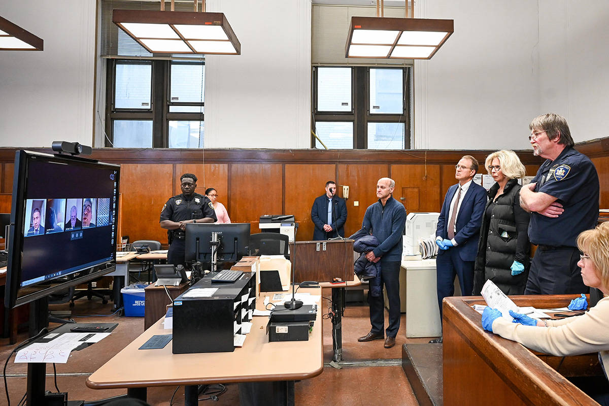 In this photo provided by the New York Unified Court System, Janet DiFiore, foreground third fr ...