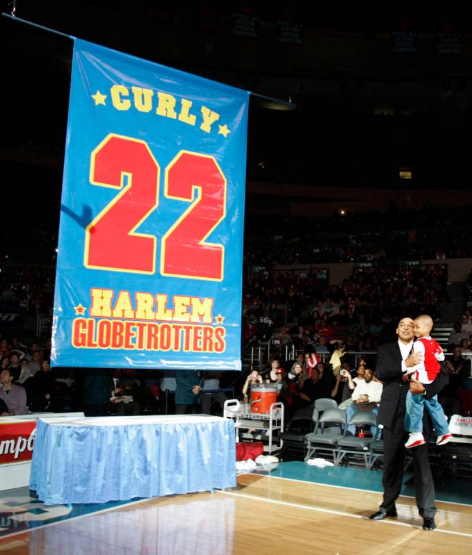 FILE - In this Feb. 15, 2008, file photo, Harlem Globetrotters' Fred "Curly" Neal loo ...
