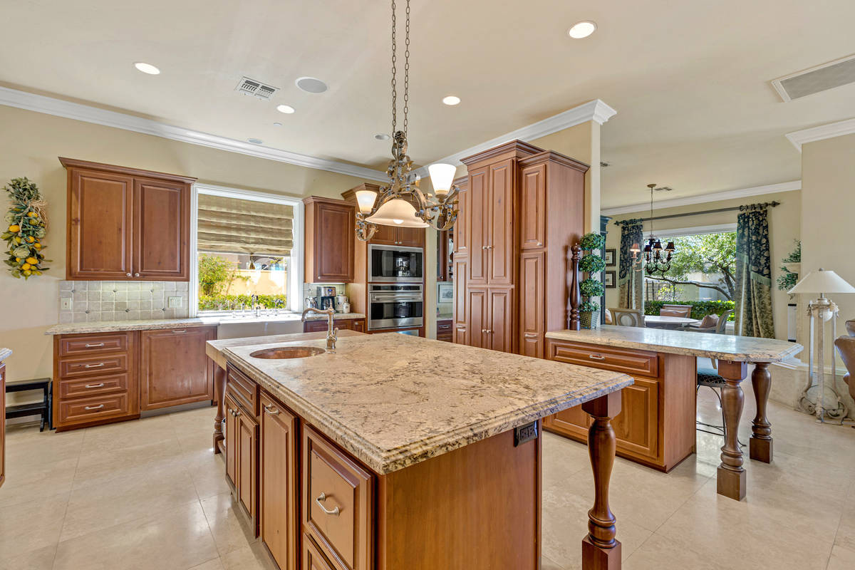 The kitchen has professional-grade Sub-Zero and Wolf appliances. (Red Luxury Real Estate)