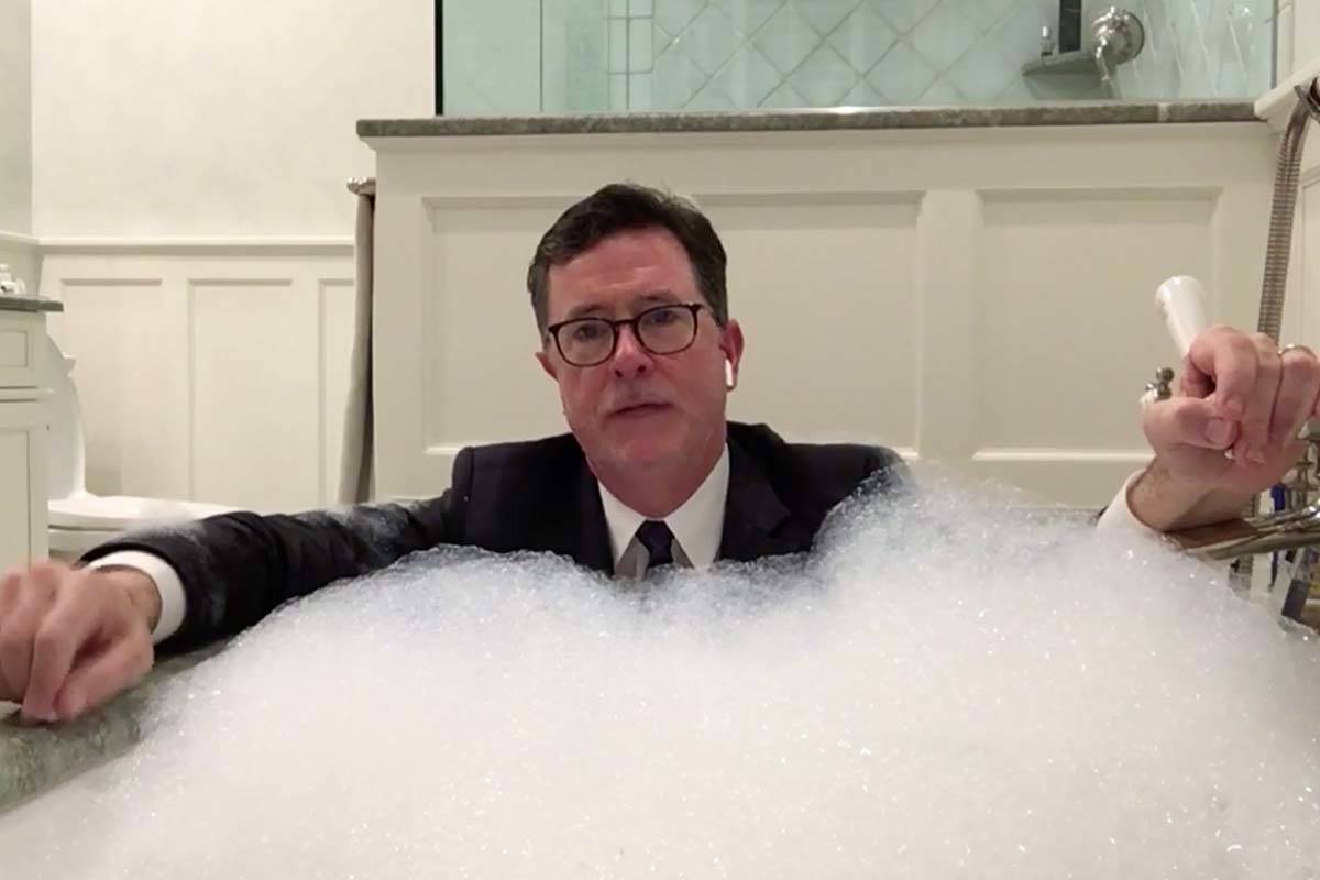 Stephen Colbert delivers a monologue from his bathtub March 16 in his first appearance on "The ...