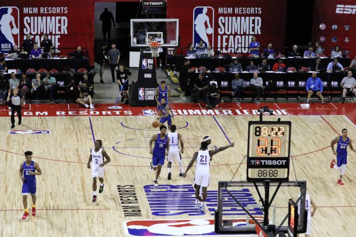 The Los Angeles Lakers and the Golden State Warriors play during their Vegas Summer League game ...