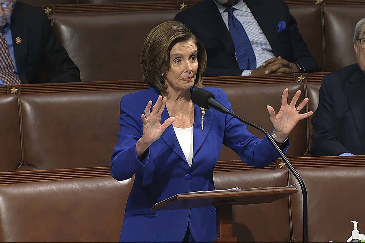 House Speaker Nancy Pelosi of Calif., speaks on the floor of the House of Representatives at th ...