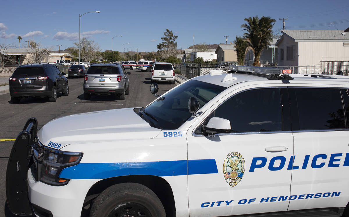 The Henderson Police Department investigates a homicide Friday afternoon, March 27, 2020, in a ...