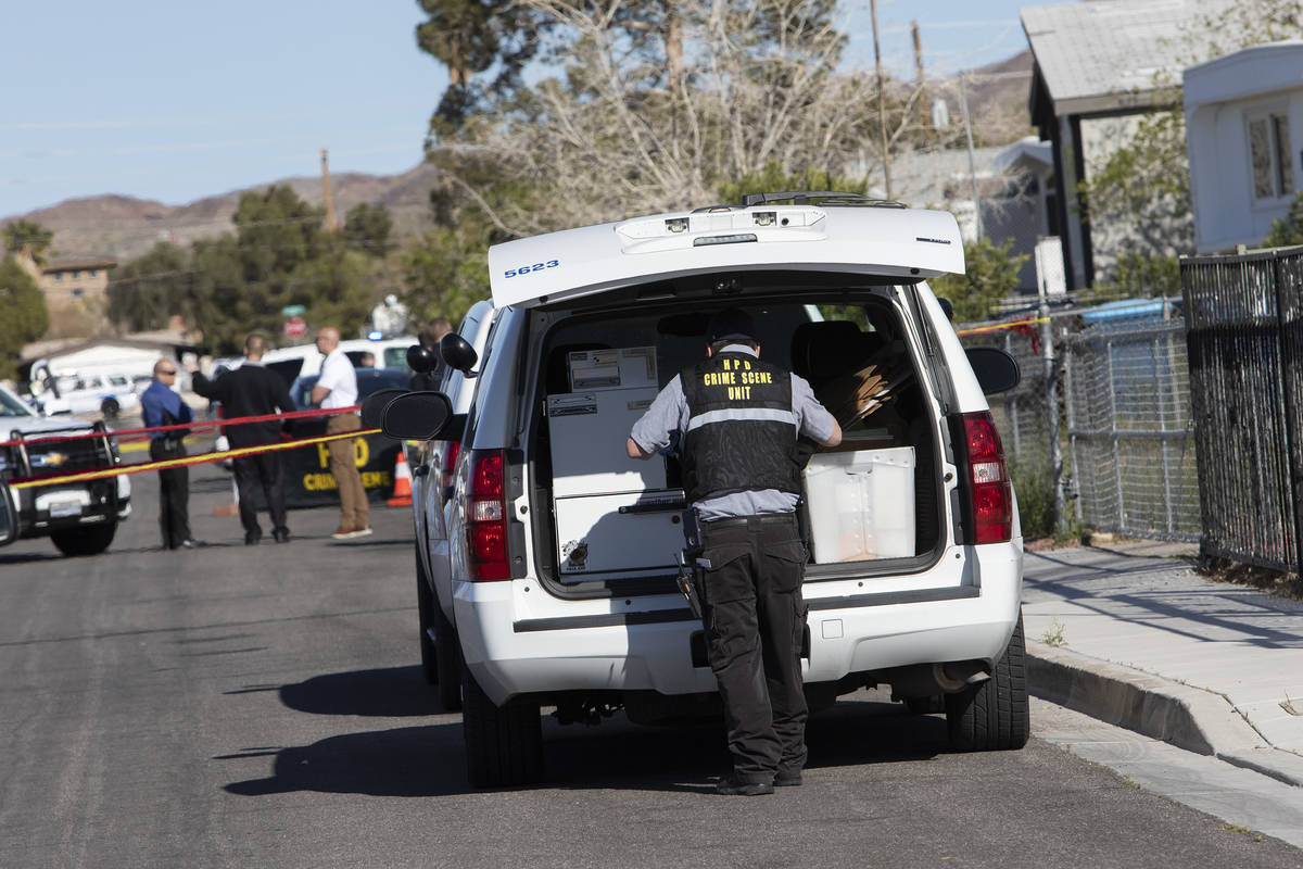 The Henderson Police Department investigates a homicide Friday afternoon, March 27, 2020, in a ...