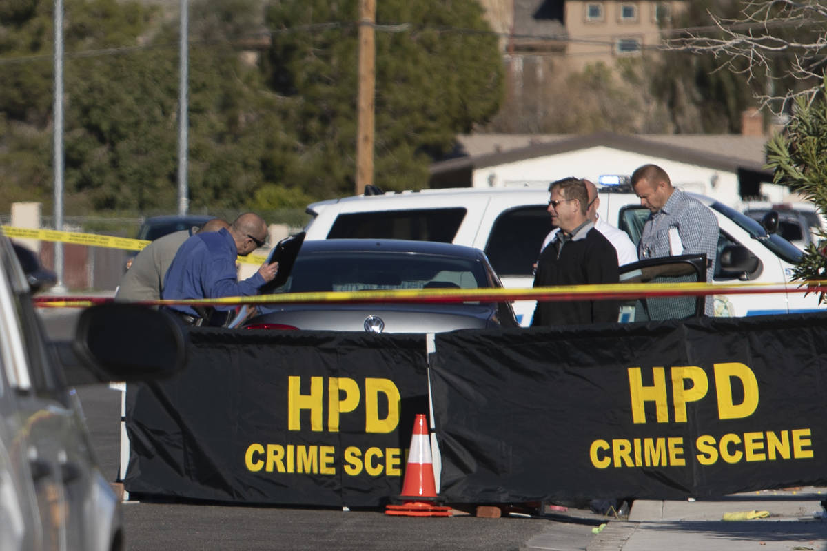 The Henderson Police Department investigates a homicide Friday afternoon, March 27, 2020, in a ...