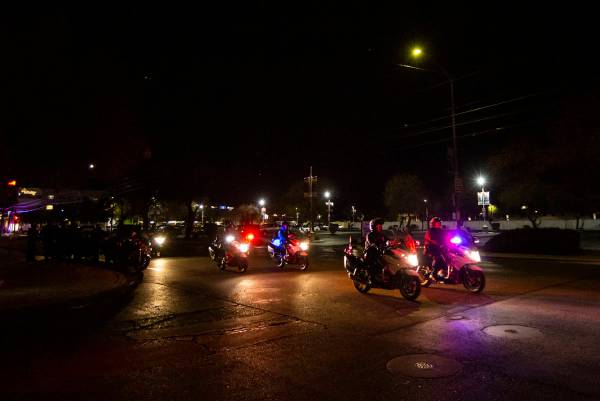 Law enforcement officers lead a procession for White Pine County Nevada Highway Patrol trooper ...