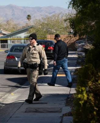 Las Vegas police continue the investigation of an apparent murder-suicide in the northeast Las ...