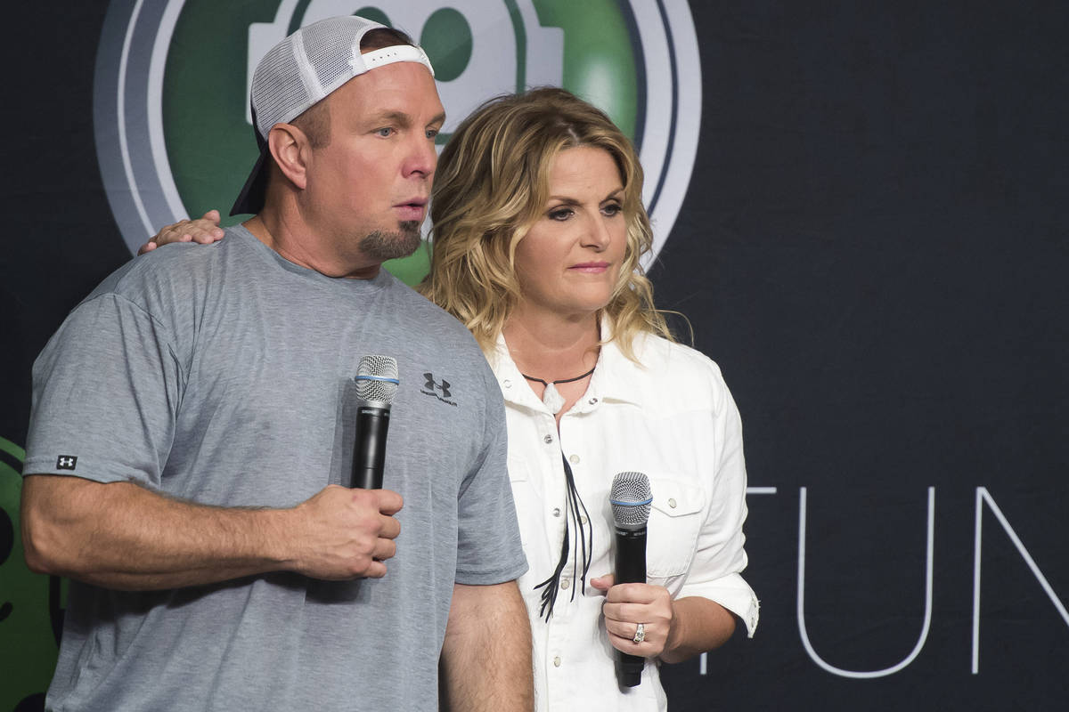 FILE - In a Friday, July 8, 2016 file photo, Garth Brooks and Trisha Yearwood attend a news con ...