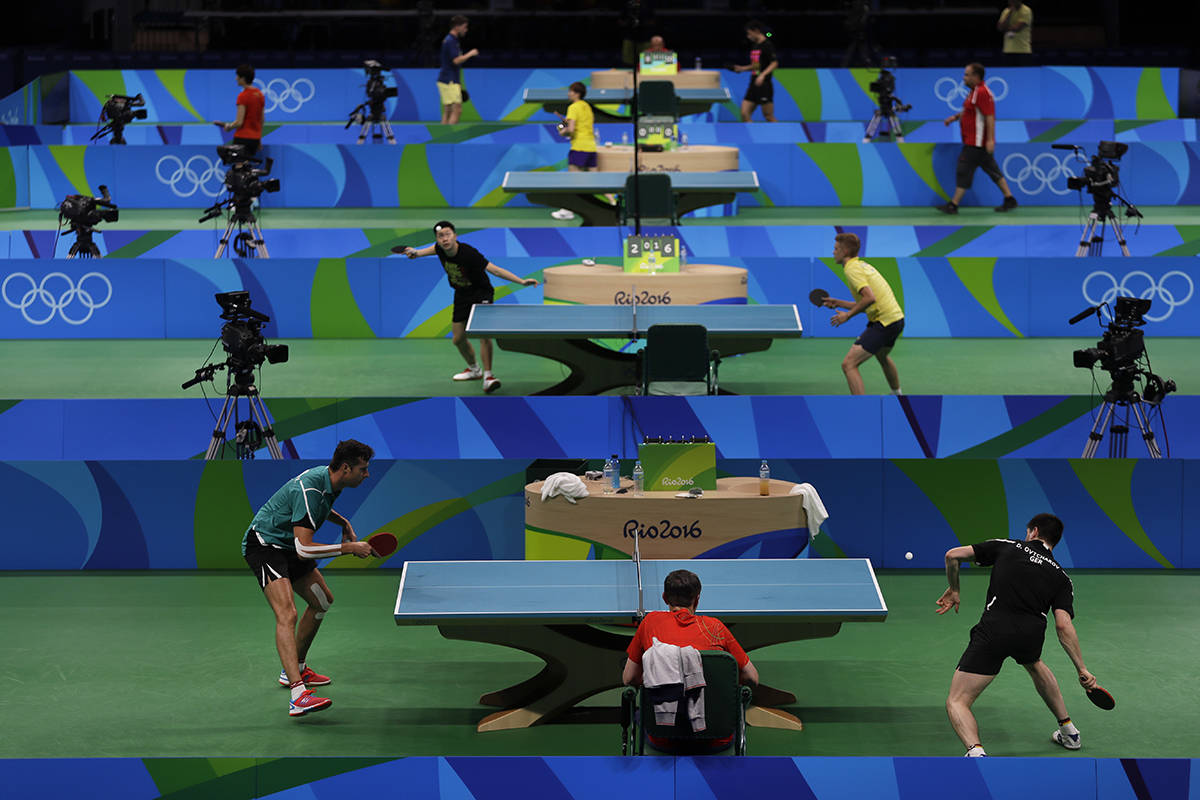 Table tennis players take part in a training session at the at the Riocentro ahead the 2016 Sum ...