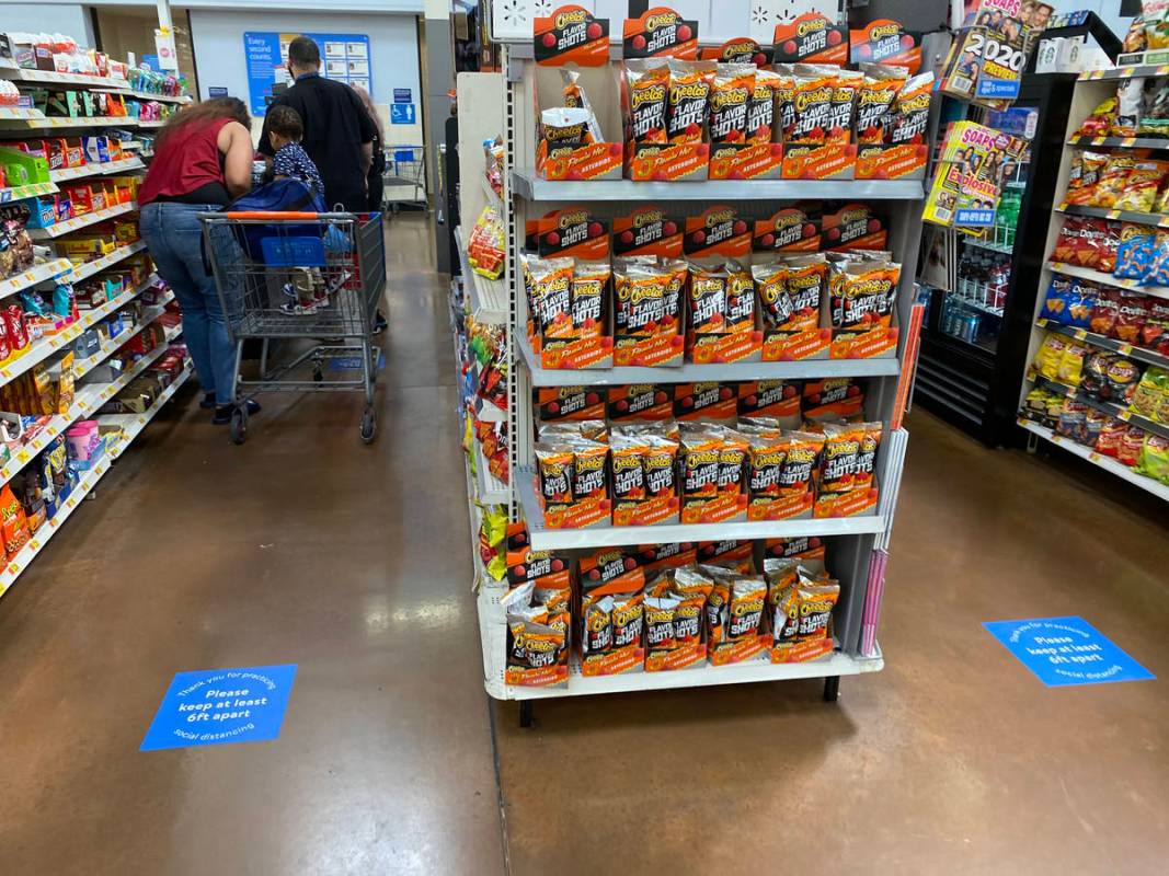 Social distancing markings on the floor at Walmart Supercenter at 3950 W. Lake Mead Blvd. in No ...