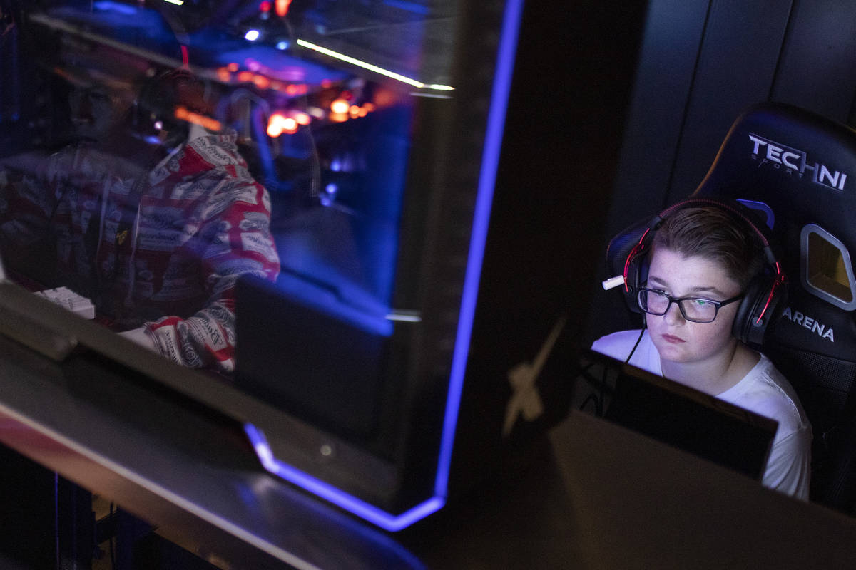 Manolo Brian Begay of Las Vegas concentrates on his game of Fortnite at The Simon Cup tournamen ...