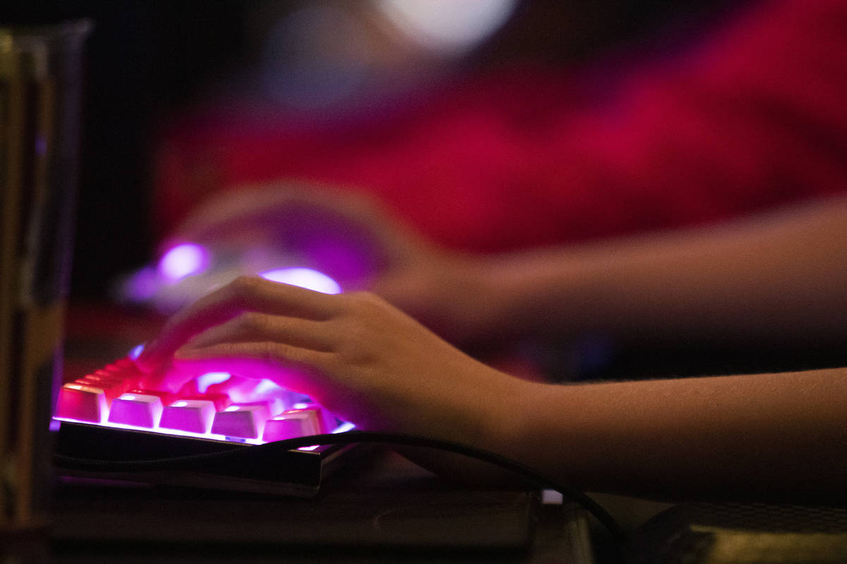 Jacob McMillian of New York plays Fortnite during the first heat of The Simon Cup tournament on ...