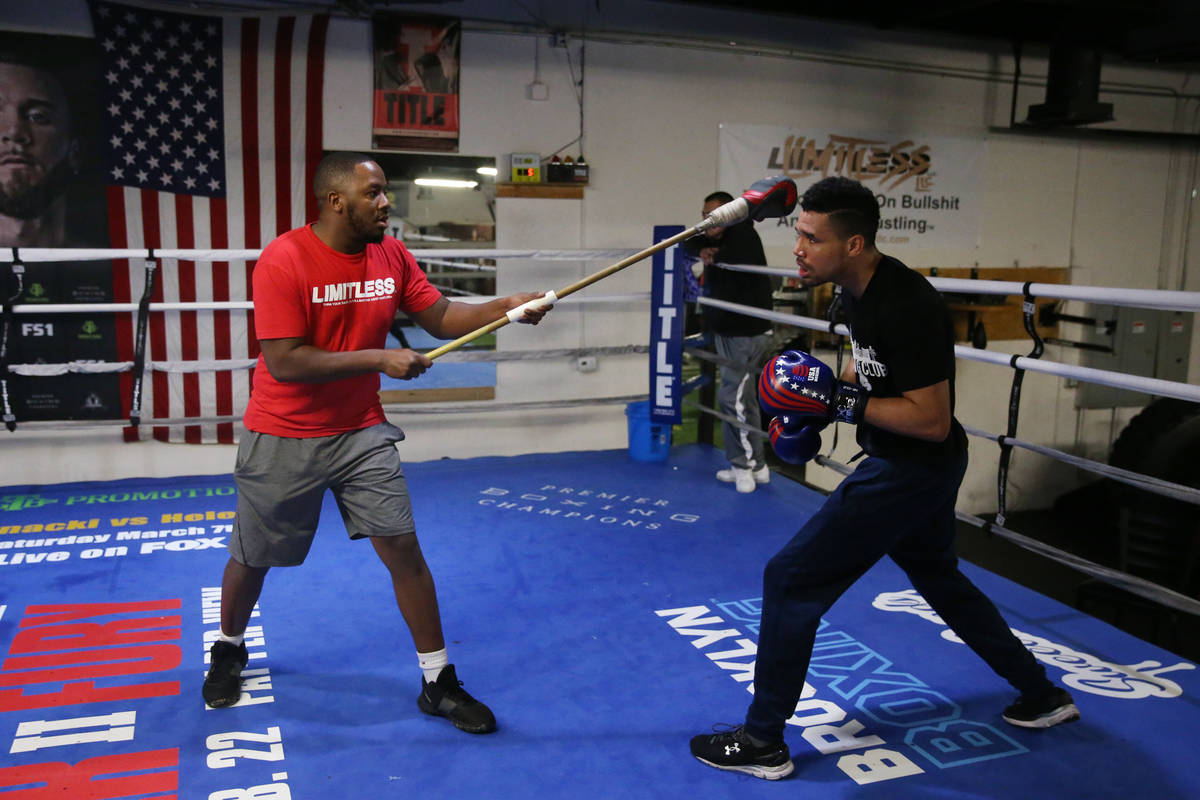 Rahim Gonzales, right, with his assistant trainer Marvin Rutta, during a workout at City Boxing ...