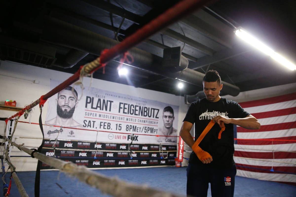 Rahim Gonzales wraps his hands for a workout at City Boxing Club in Las Vegas, Friday, Feb. 28, ...