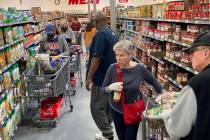 Shoppers at WinCo Foods at 7501 Washington Ave. in Las Vegas Tuesday, March 31, 2020. (K.M. Can ...