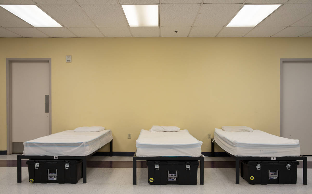 Three of ten beds are prepared for any coronavirus cases for clients of Catholic Charities of S ...