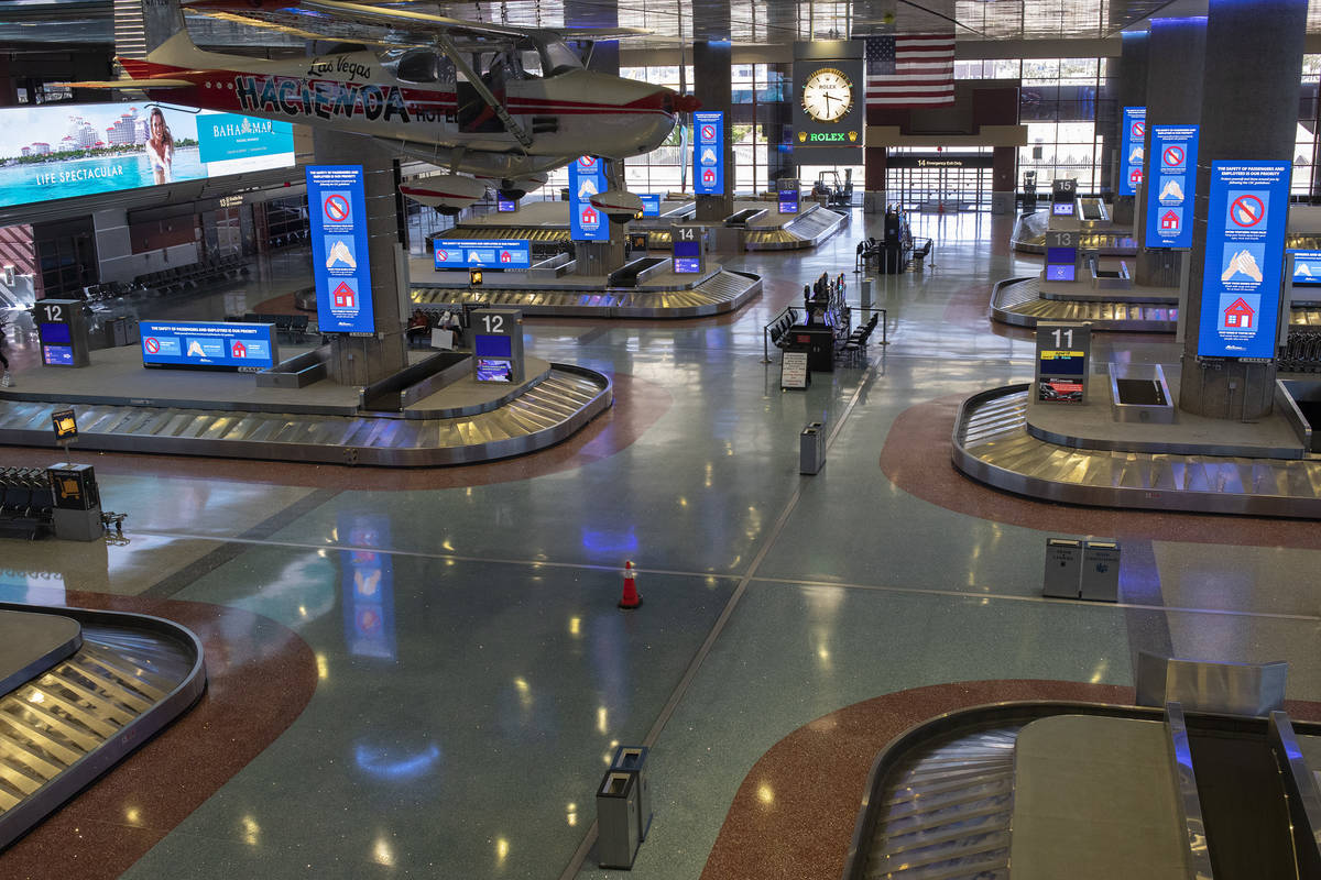Baggage claim in Terminal 1 is empty at McCarran International Airport on Wednesday, April 1, 2 ...
