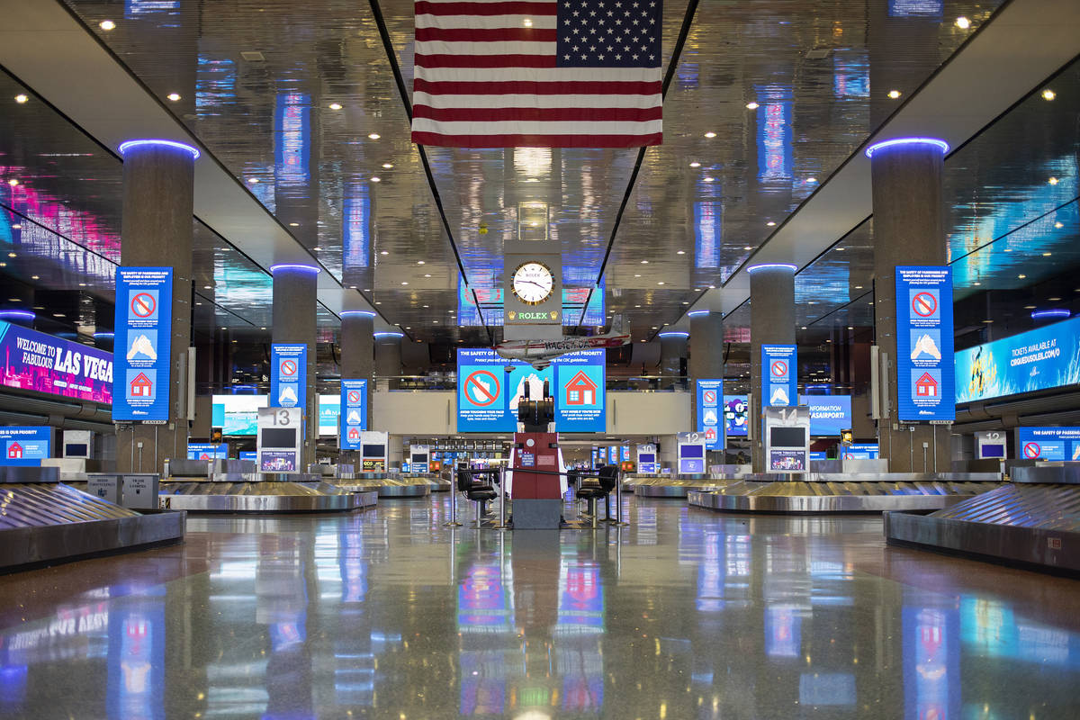 No travelers can be seen at baggage claim in Terminal 1 at McCarran International Airport on We ...