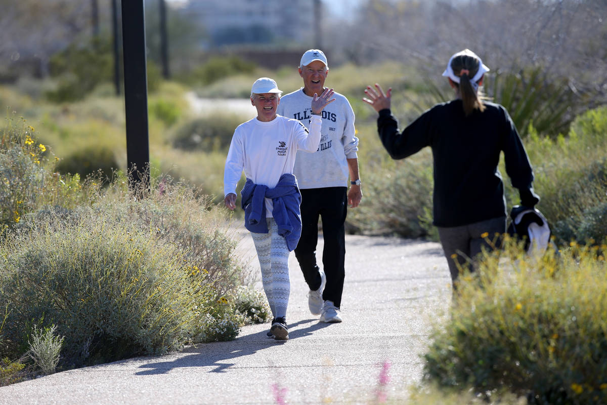 Mike and Ellen Jones, left, wave at Lois Widell, all of Las Vegas, at Hualapai Canyon hiking ar ...