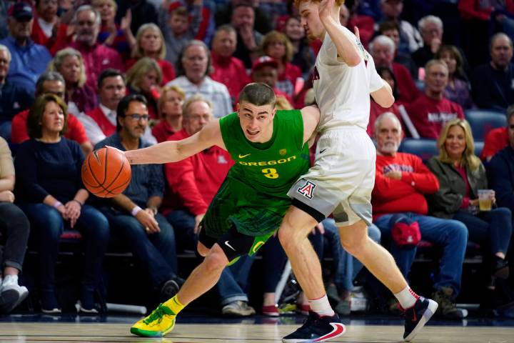 In this Feb. 22, 2020, file photo, Oregon guard Payton Pritchard (3) drives against Arizona dur ...