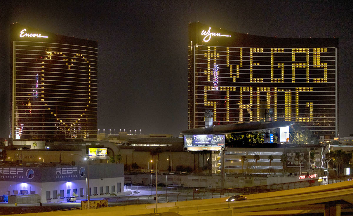The exterior lights at Encore and Wynn are turned off with the resort strategically illuminatin ...