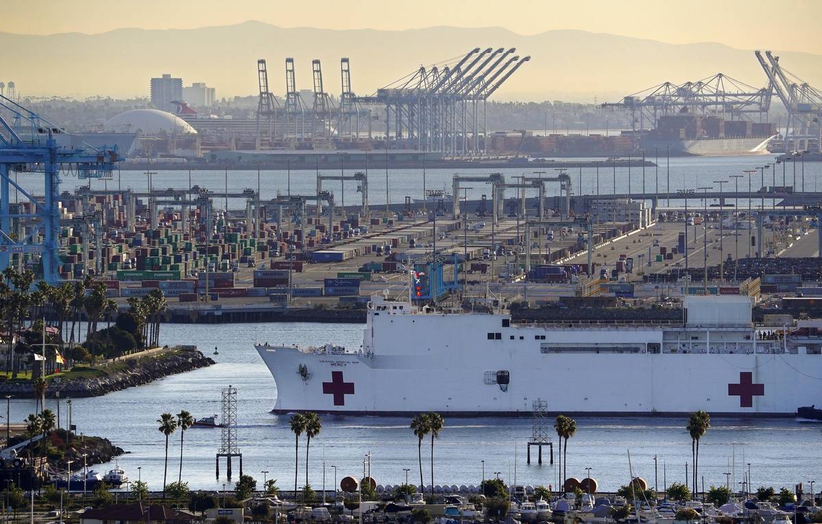 FILE - In this March 27, 2020, file photo, The USNS Mercy enters the Port of Los Angeles in Los ...