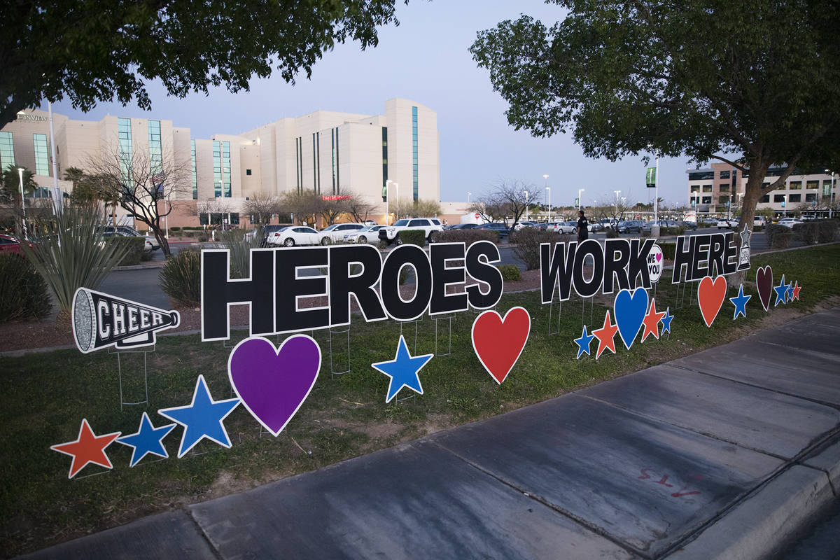 A sign on the grass outside Mountain View Hospital in Las Vegas, Wednesday, April 1, 2020. The ...