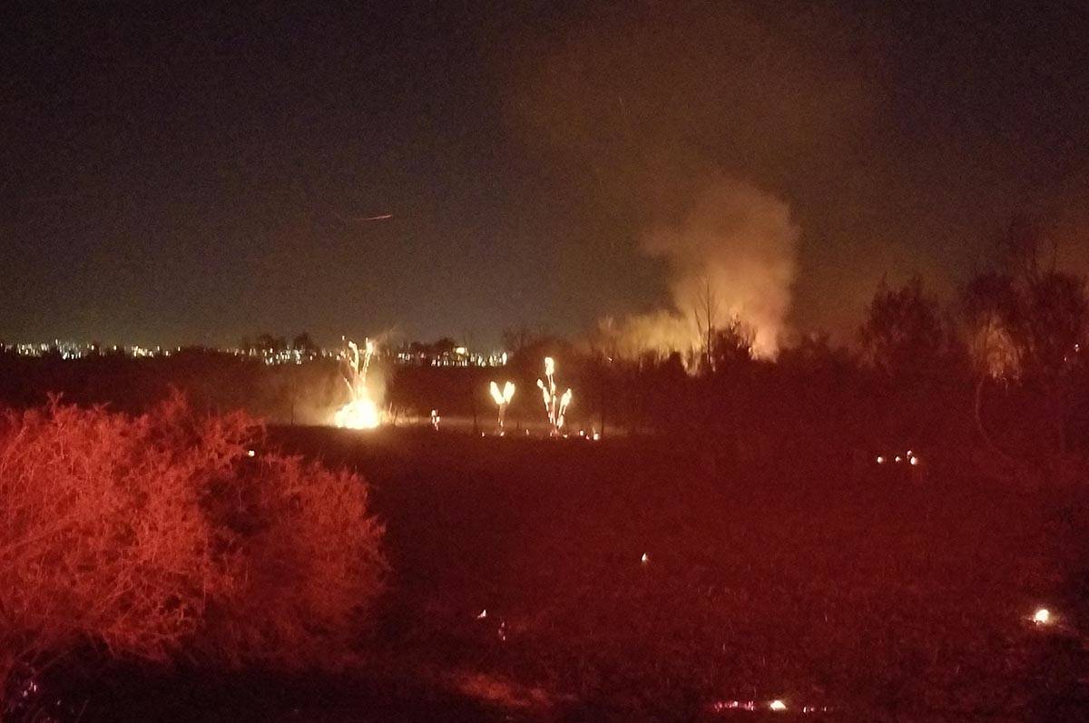 A 10-acre fire is burning at the preserve section of Wetlands Park in east Las Vegas. One pedes ...