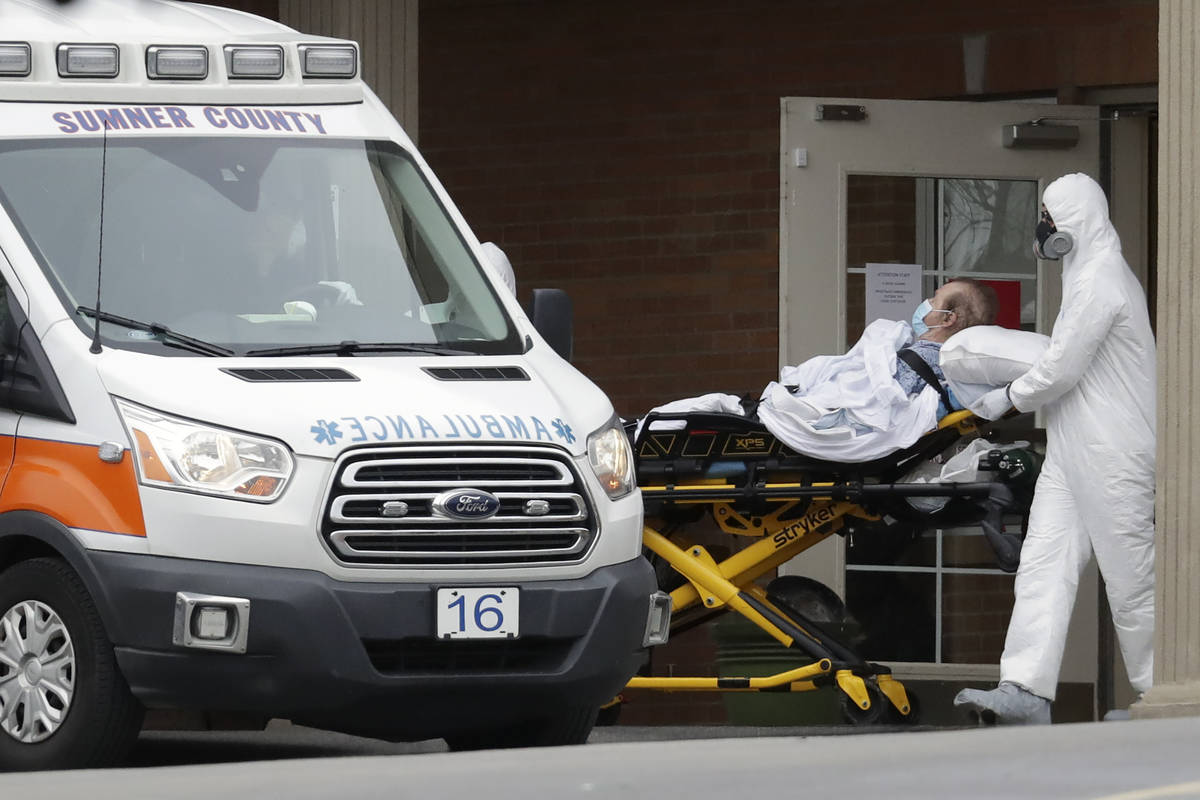 A resident is removed from the Gallatin Center for Rehabilitation and Healing, Monday, March 30 ...