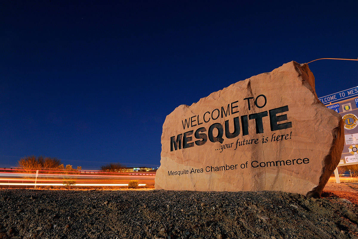 Car lights streak by in front of the "Welcome to Mesquite" sign (Las Vegas Review-Journal/file)