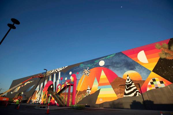 Eric Vozzola working on his mural at Area 15, Las Vegas, NV ( Kate Russell, Courtesy of Meow Wolf)