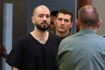 Tarik "Torque" Goicoechea, 34, left, is led into the courtroom at the Regional Justice Center o ...