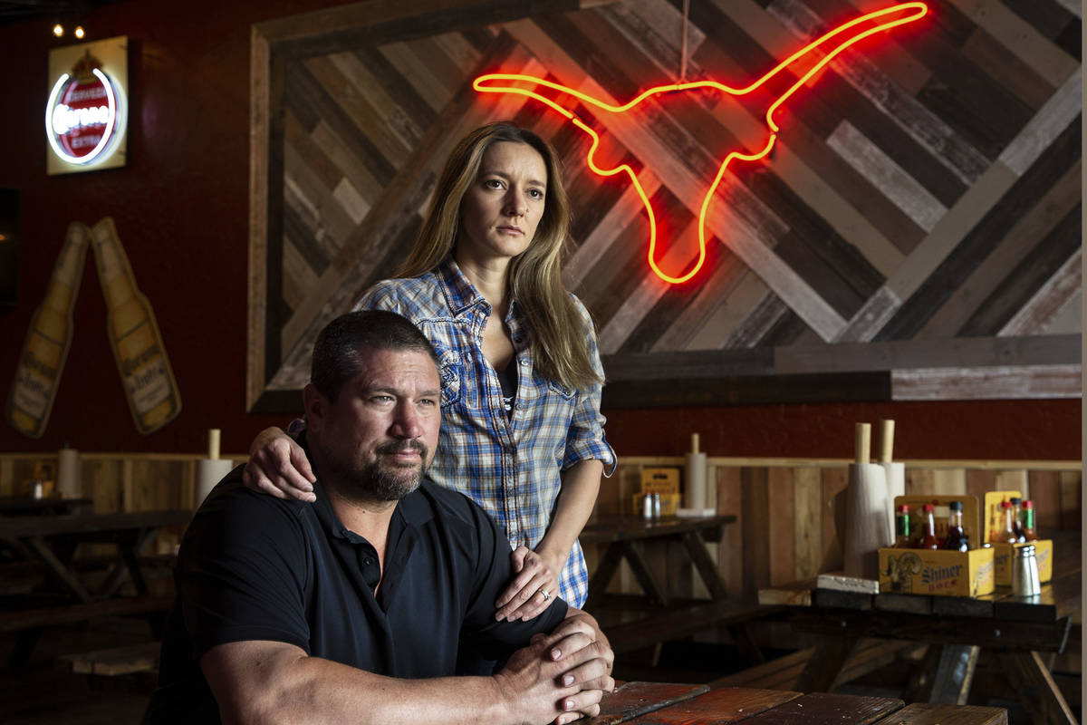 Brian Buechner, left, and wife Natalia Badzjo, owners of Big B's Texas BBQ, on Thursday, March ...