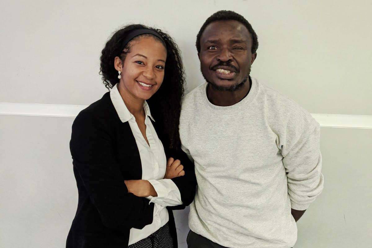 Christopher Njingu, right, an asylum seeker from Cameroon, with his attorney, Enedina Kassamani ...