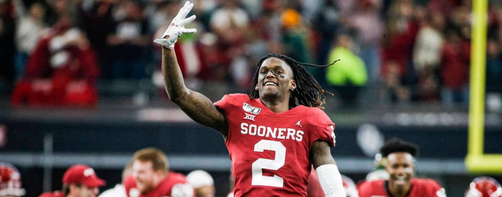 Oklahoma wide receiver CeeDee Lamb (2) celebrates a 30-23 overtime win against Baylor during th ...