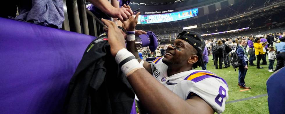 LSU linebacker Patrick Queen leaves the field after their win against Clemson in a NCAA College ...