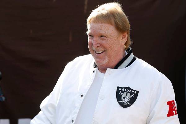 Oakland Raiders owner Mark Davis smiles before an NFL football game between the Raiders and the ...
