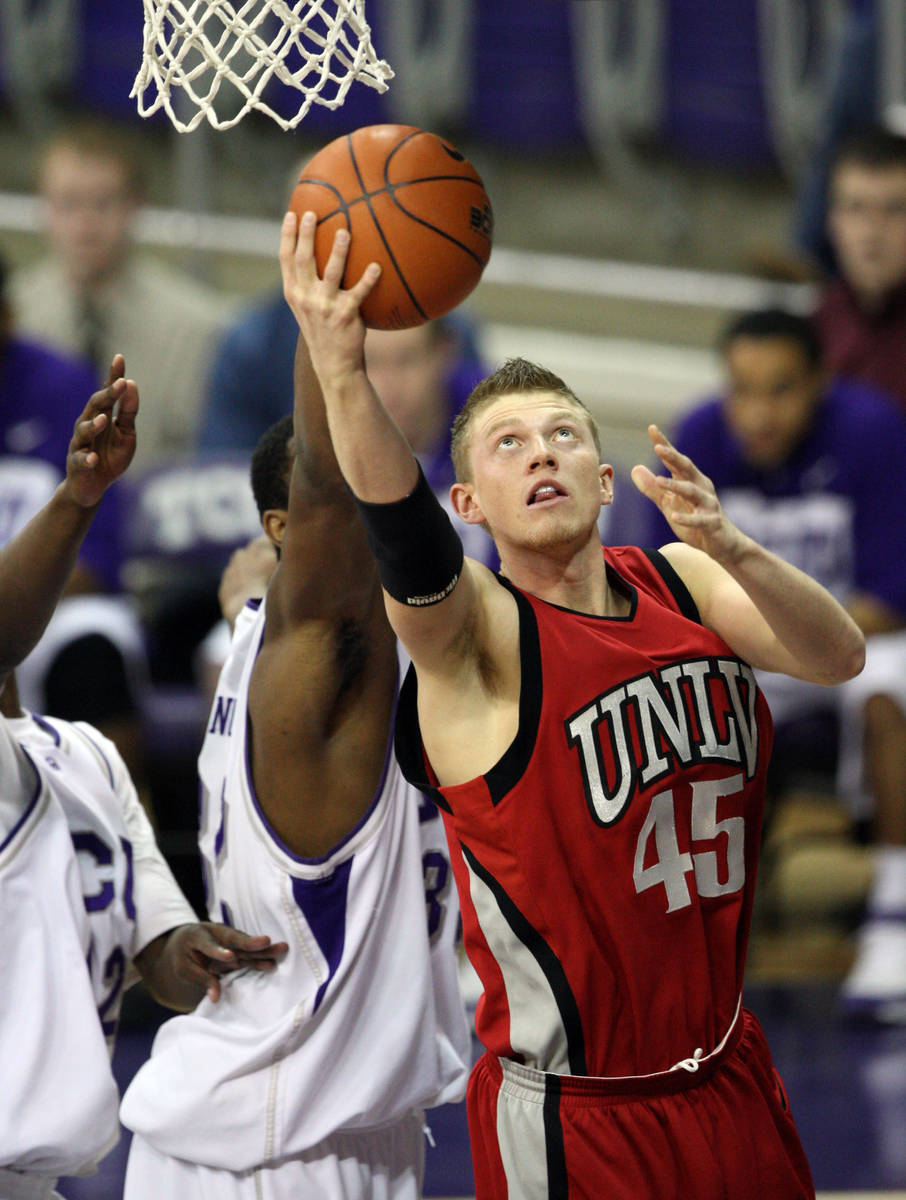 UNLV basketball player Joe Darger (45) scores inside in the first half of a college basketball ...