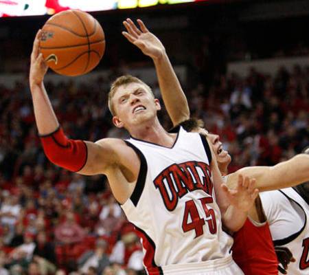 Joe Darger of UNLV grabs a rebound against New Mexico during their game at the Thomas & Mack Ce ...